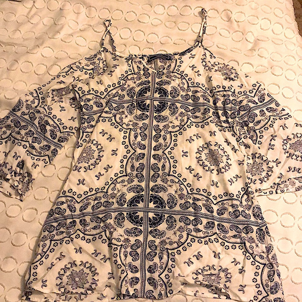 Cold shoulder, paisley blouse.